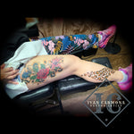 Floral Tattoo With  Colorful Cheetah Print On The Leg